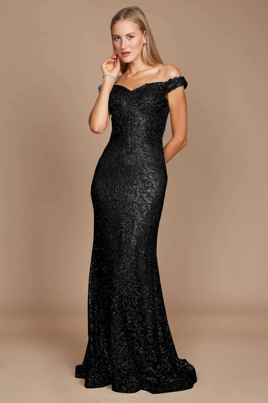 Black formal dress in lace and satin with an off shoulder style and mermaid tail.
